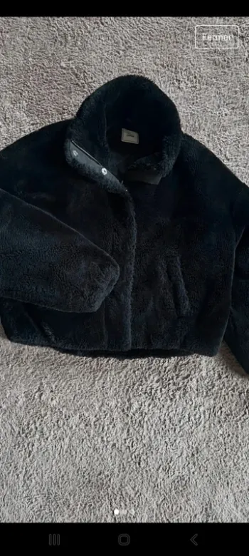 Manteau en fausse fourrure