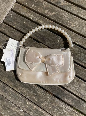 Pochette blanche Claire’s