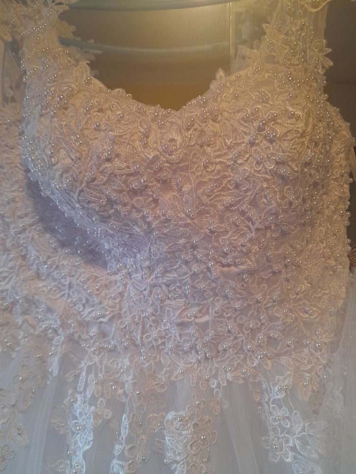 Robe de mariée laçage et perles