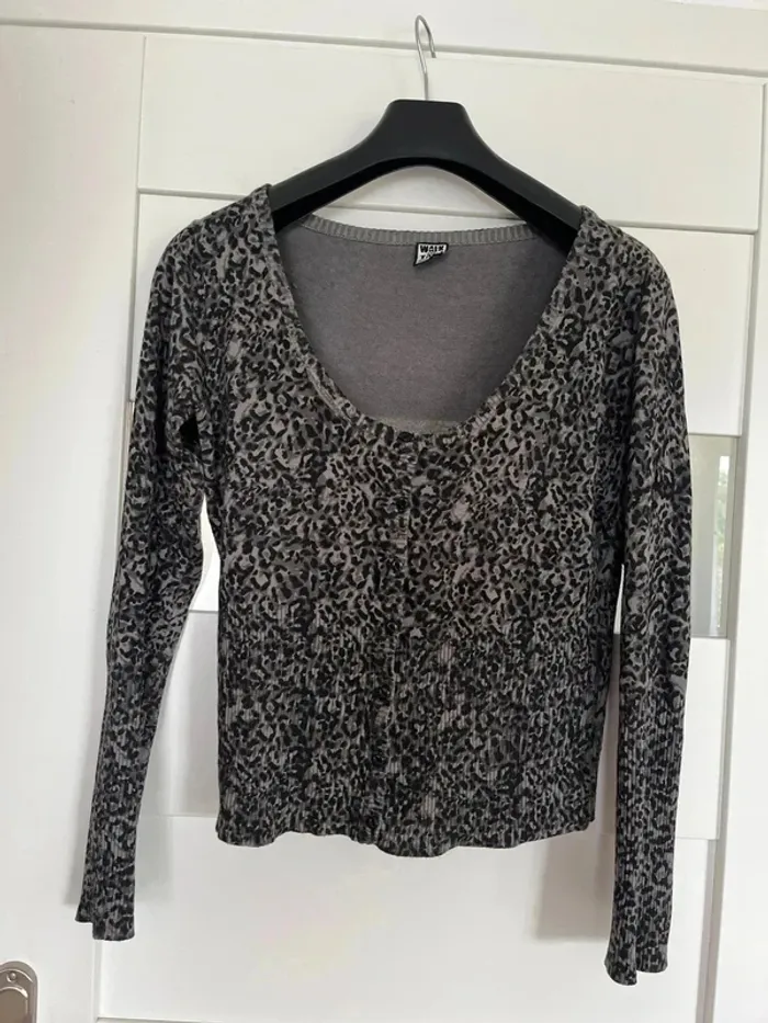 Gilet boutons