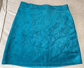Jupe turquoise.