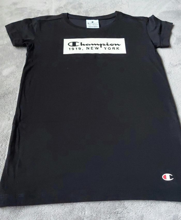 Robe noire Champion 4ans