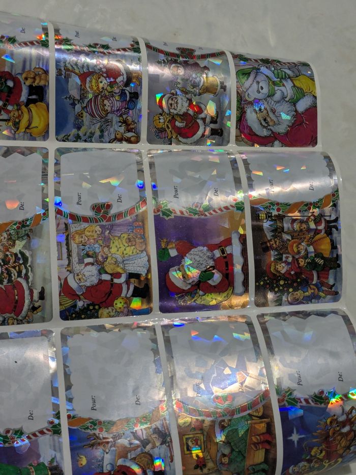 Lot de 12 étiquettes brillantes pour vos cadeaux de Noël.