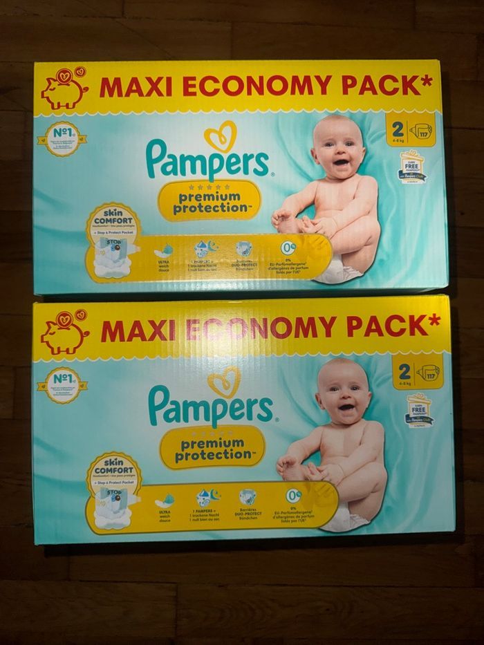 2 cartons de couches Pampers taille 2