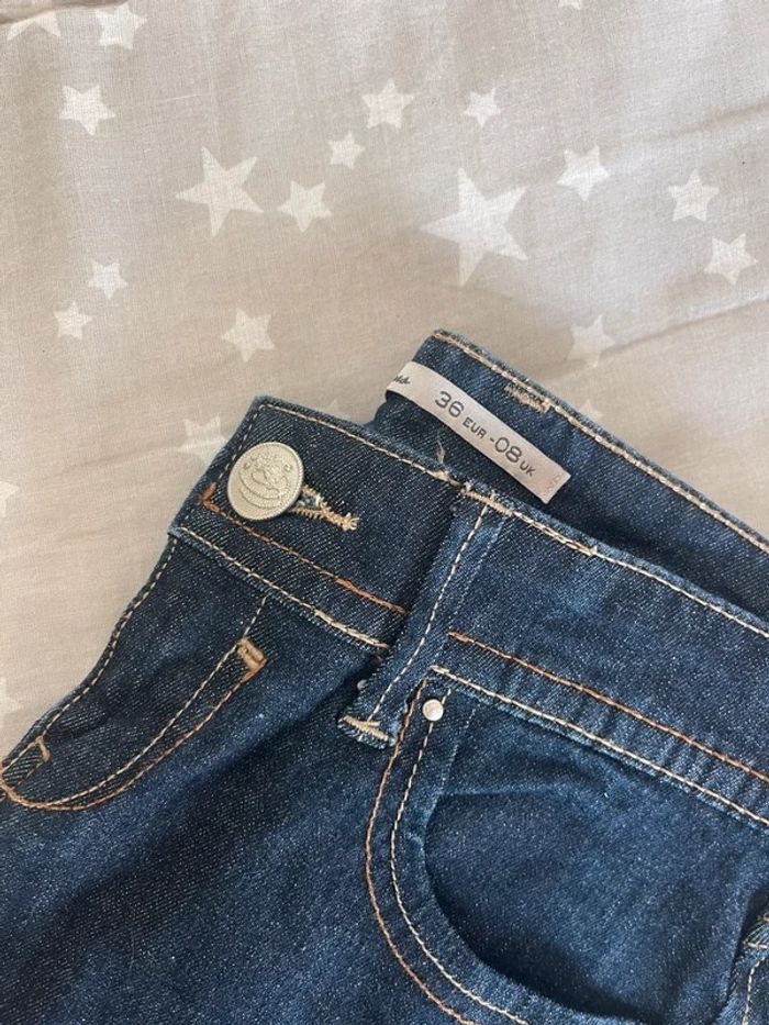 Pantalón vaquero oscuro