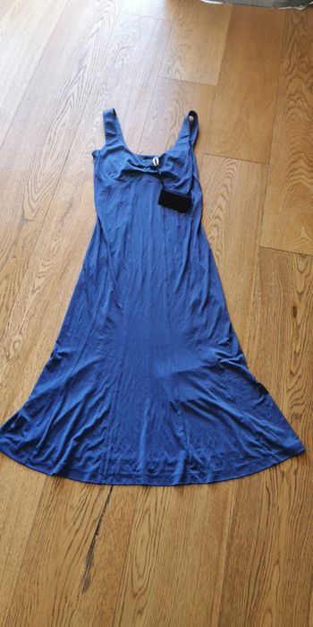 Robe moulante évasée au bas