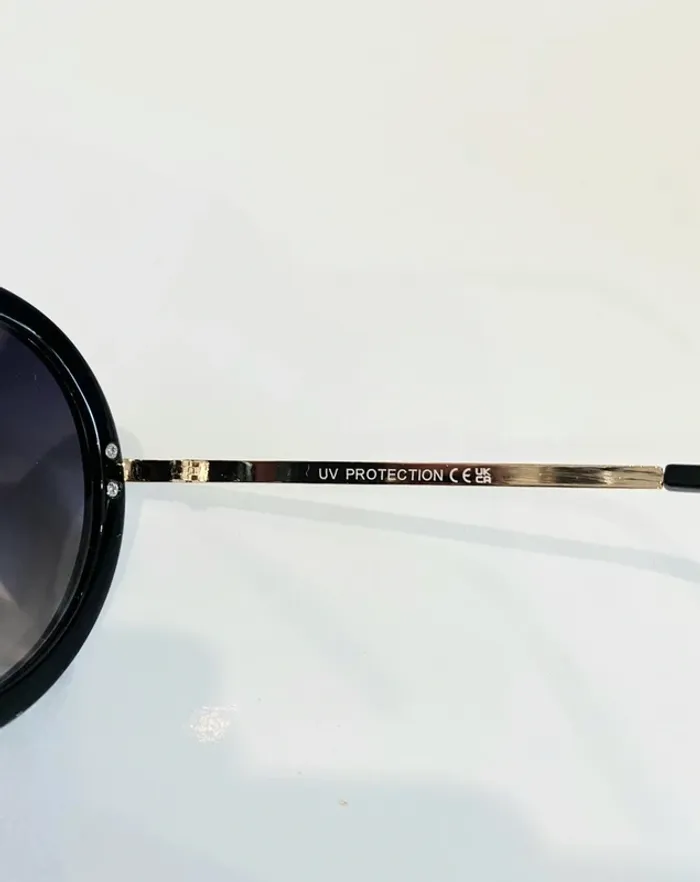 Lunette de soleil femme ronde noire et dorée verres dégradés UV protection catégorie 3 - photo numéro 5