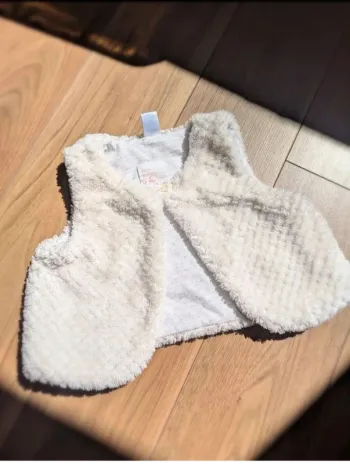 Gilet boléro moumoute sans manche