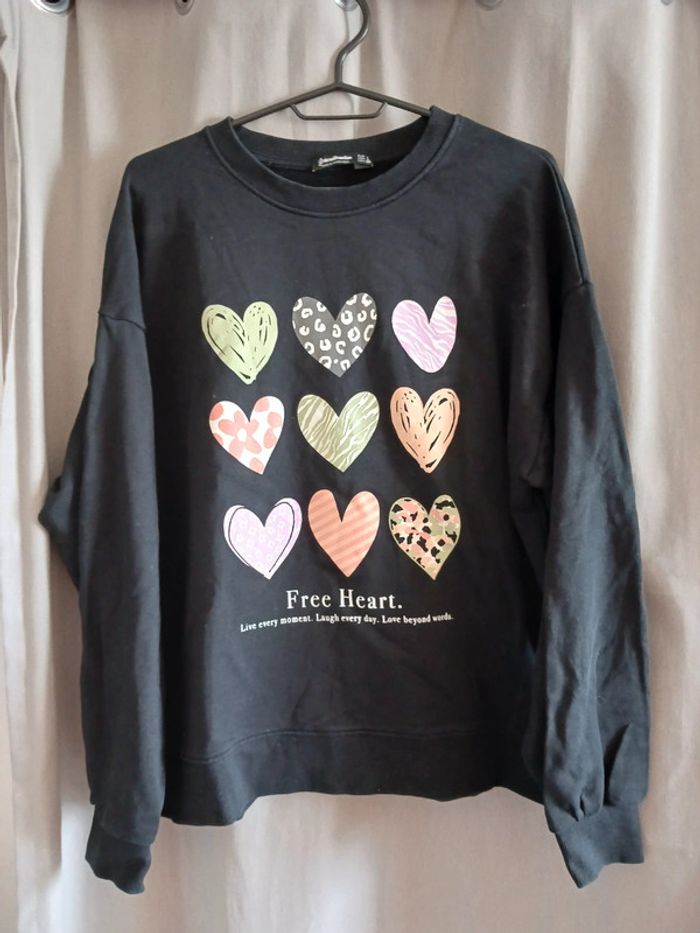 Pull noir Free Heart Stradivarius Taille L40