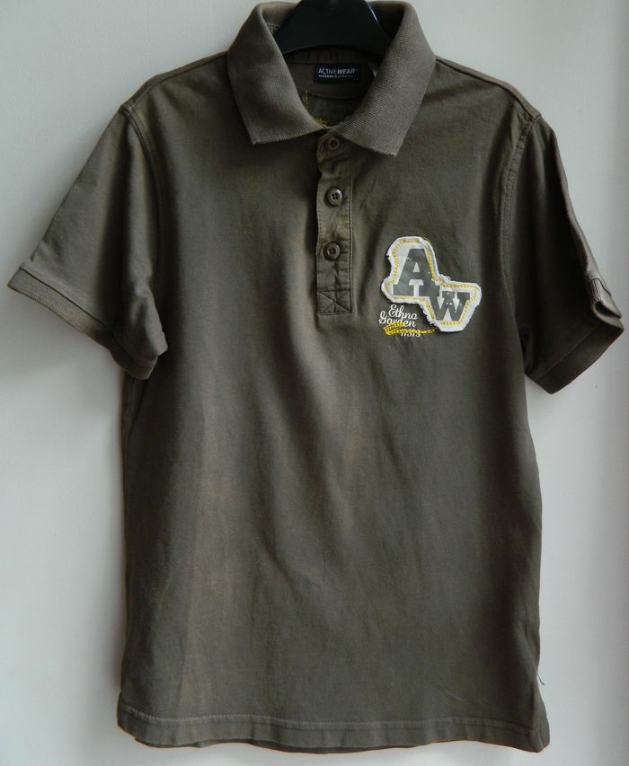 Polo manches courtes T 10 ans "La Redoute"