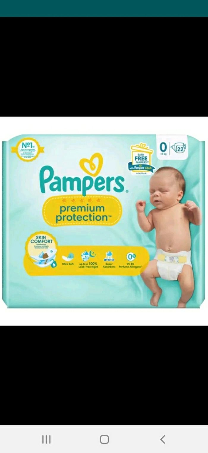 110 couches T0 premium protection 5 paquets neufs.