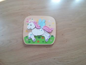 Puzzle en bois licorne 7 pièces