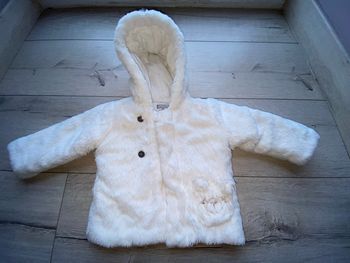 Manteau blanc en pilou pilou