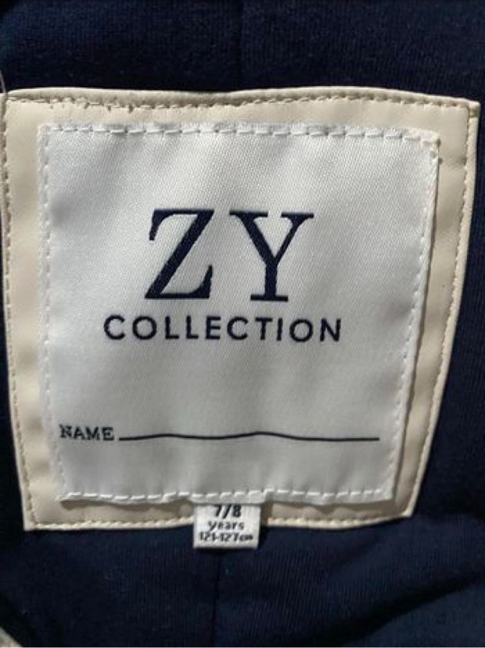 Manteau coupe vent et  blanc intérieur bleu marine ta 7/8 ans - photo numéro 4
