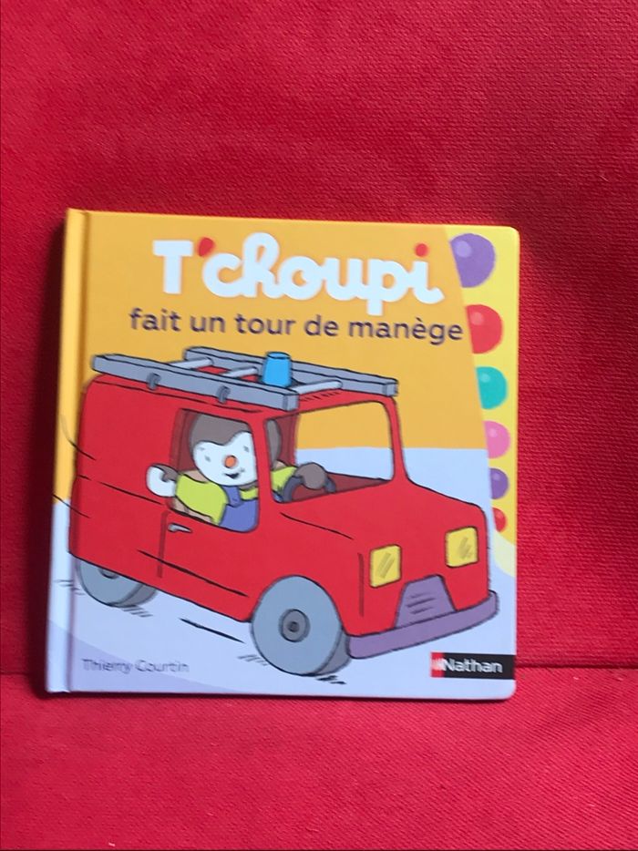 Livre tchoupi fait un tour de manège