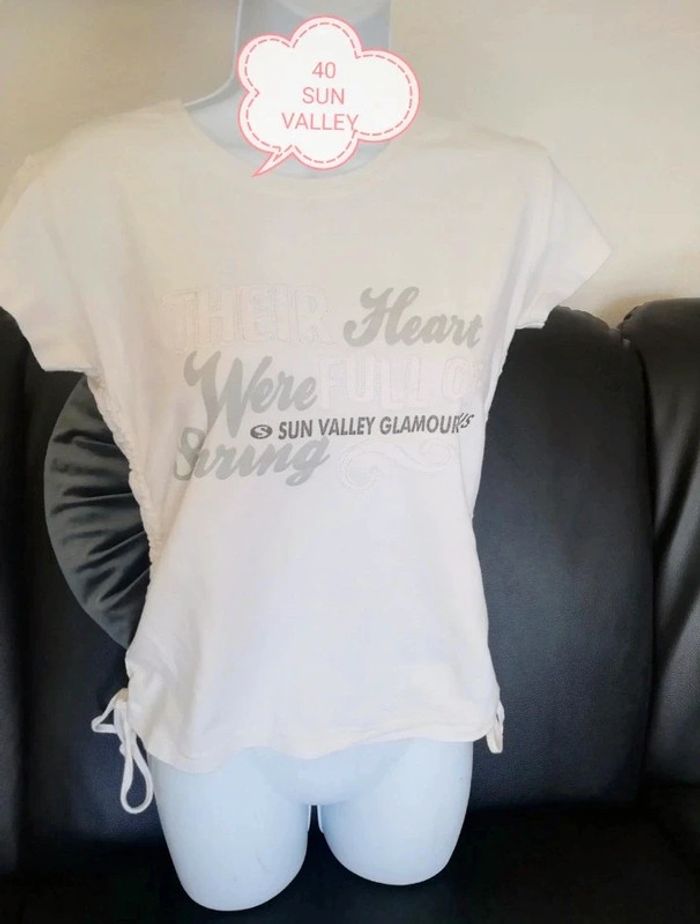 Tee shirt serrage côté femme.40..