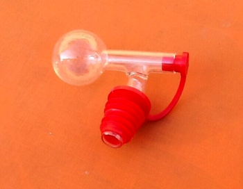 Bouchon Doseur  Plastique rouge / transparent