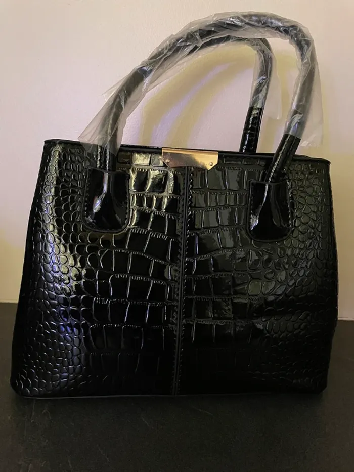 Sac à mains vernis noir