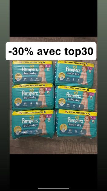 Six paquets de couches Pampers taille 4+