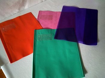 Lot de 4 petits protège à cahier en plastique rose,vert,orange,,violet