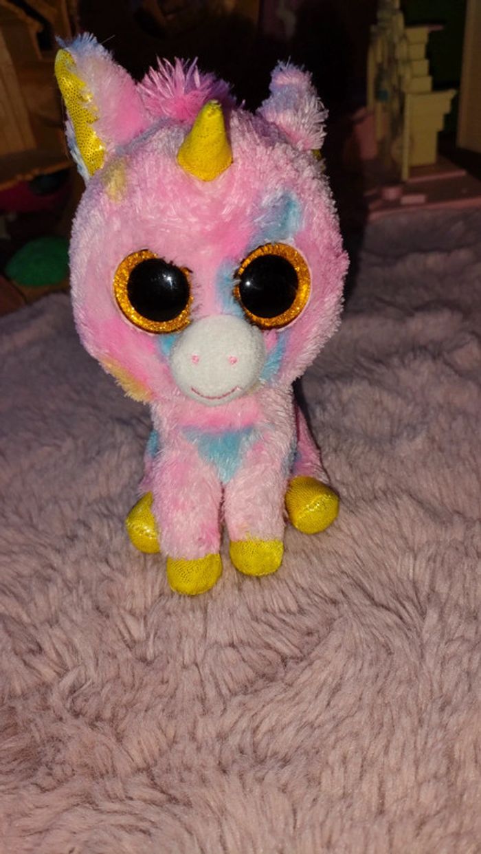 Peluche licorne multicolore