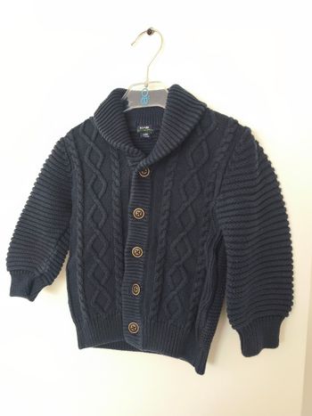 Gros gilet maille torsadée