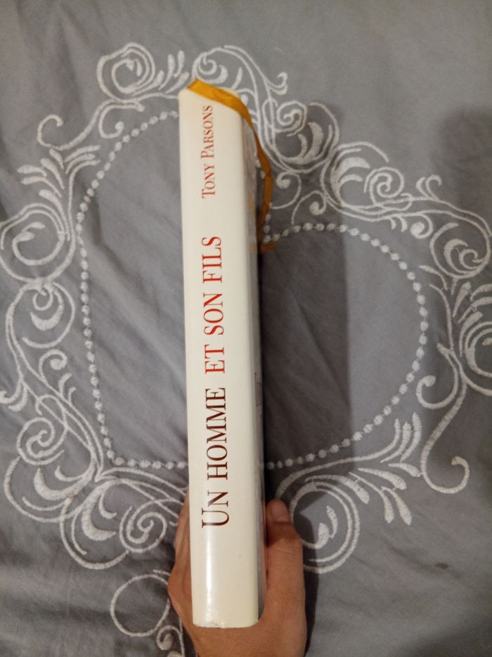 Livre (4) 📚 Un homme et son fils - photo numéro 3