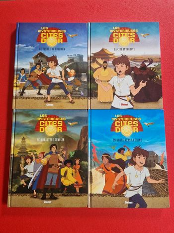 Lot de 4 livres les mystérieuses cités d or