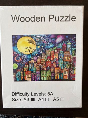 Puzzle bois grand A3 avec pièces en forme animaux ou objets ou asymétriques difficile d.une ville style peinture