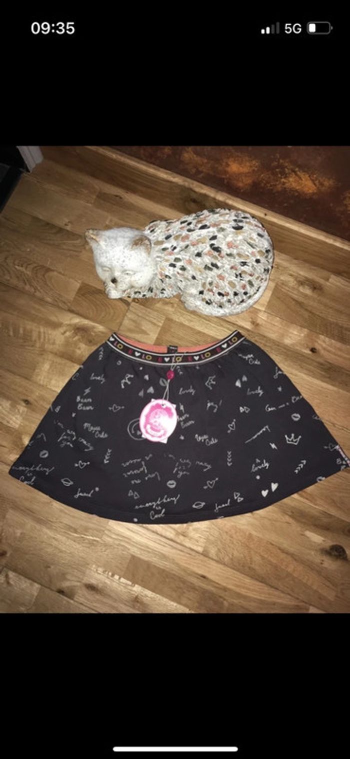 Jupe grise motifs jubelo neuve avec étiquette 8 ans/128 cm