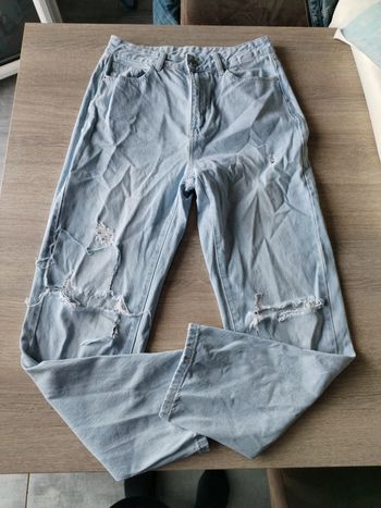 Jean troué taille m