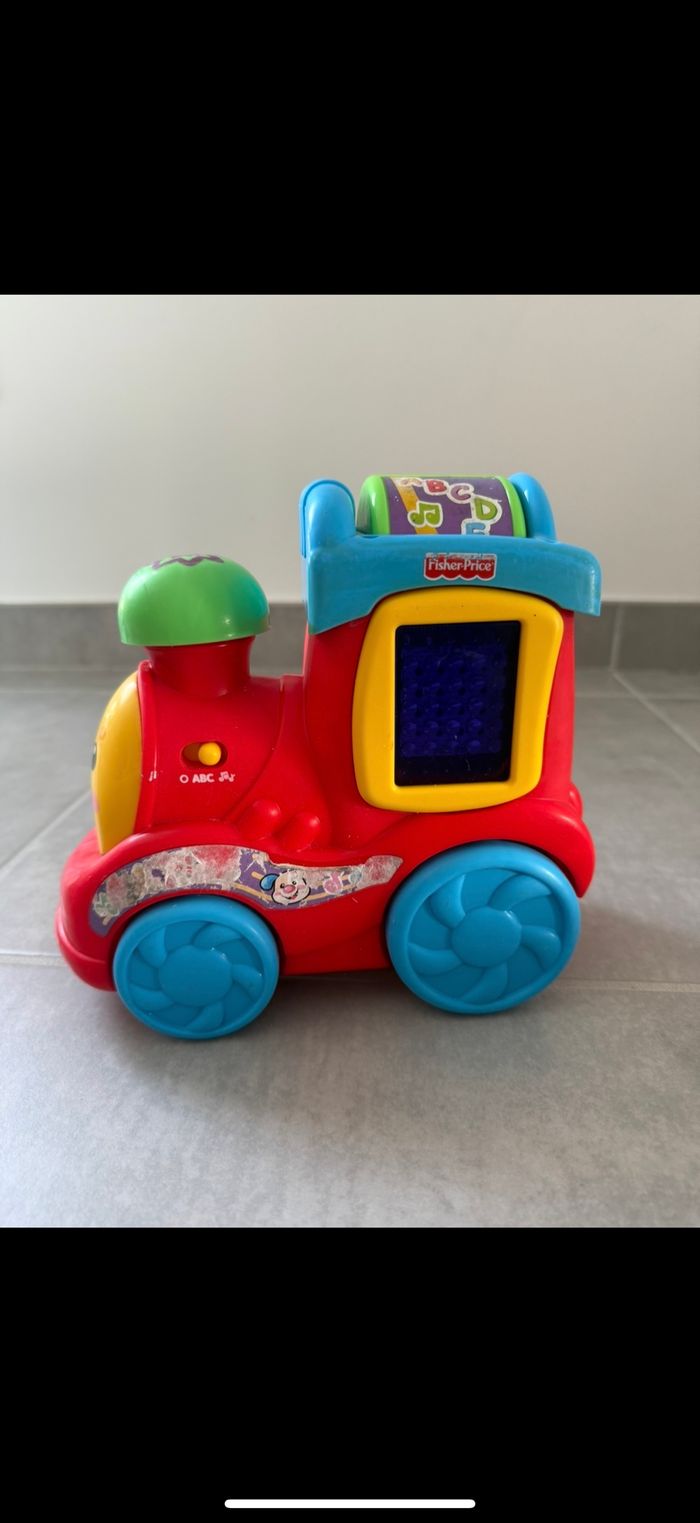 Locomotive lumineux et sonore Fisher Price - photo numéro 2