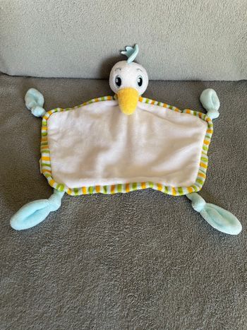 Doudou plat canard oiseau blanc bleu jaune vert