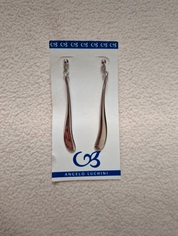 Neuf jolie paire de boucles d'oreilles pendente argenté