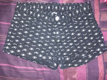 Joli short noir à motifs zeeman 10ans