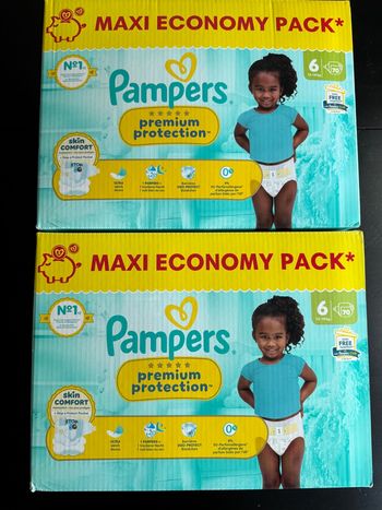 140 couches pampers premuim taille 6