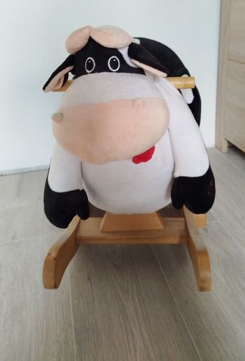 Vache à bascule en bois