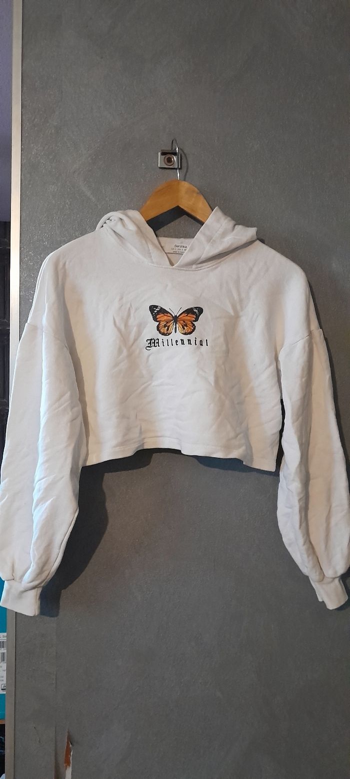 Pull cour à capuche