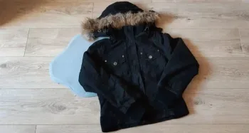 Blouson épais et chaud noir en bon état taille M