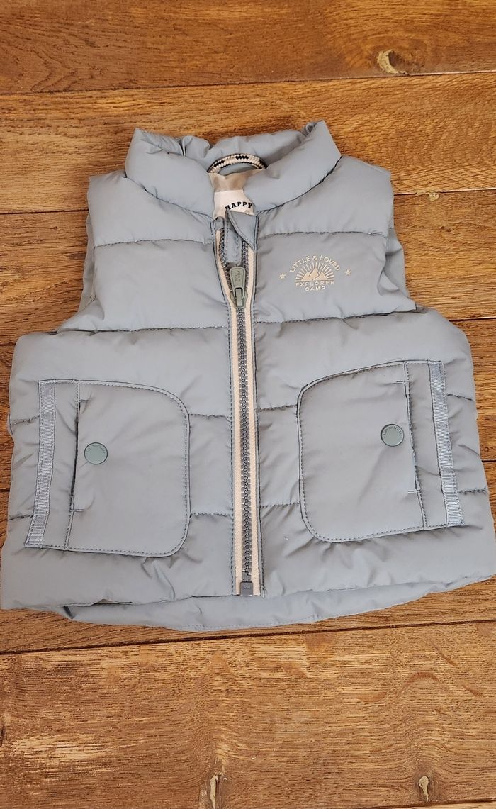 Veste sans manches bleue taille 68cm (6 mois)
