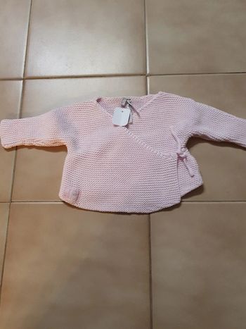 Gilet porte-feuille naissant