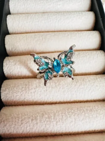 Bague papillon en argent fait main – taille ajustable, pierres bleues éclatantes