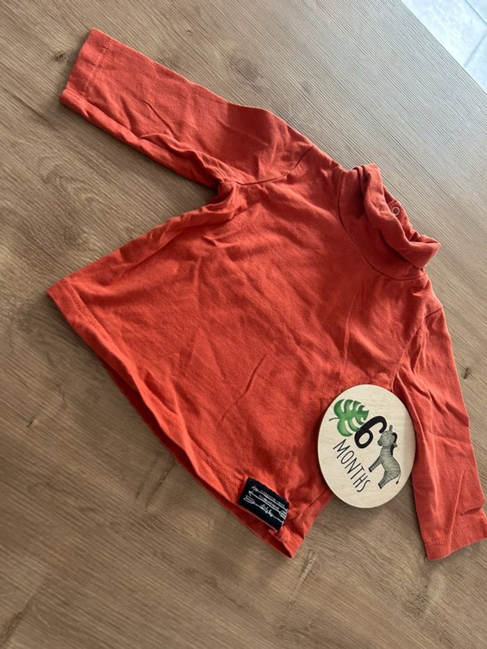 Col roulé orangé Tape à l’œil