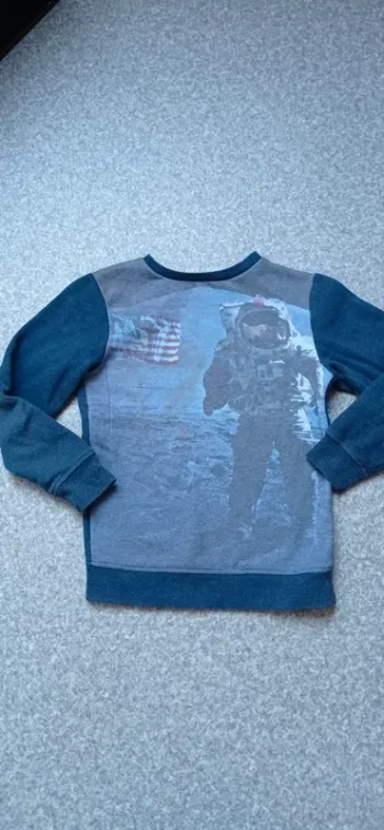 Kiabi pull astronaute