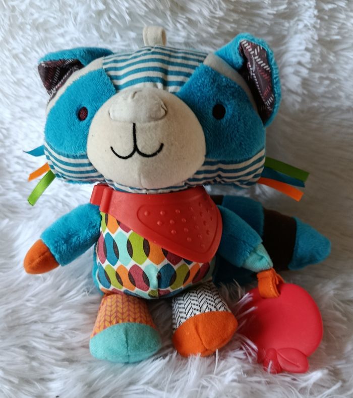Doudou peluche d activités raton laveur bleu et multicolore - Skip Hop - photo numéro 1
