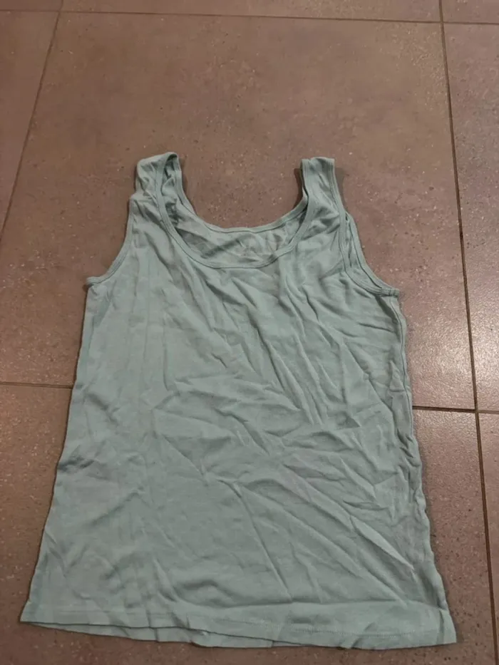 Débardeur turquoise U essentiel taille 42/44, très bon état