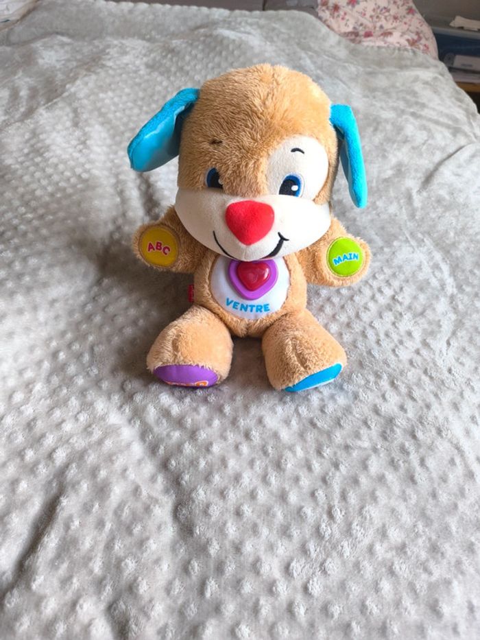 Peluche musicale d'Éveil Puppy en très bon état