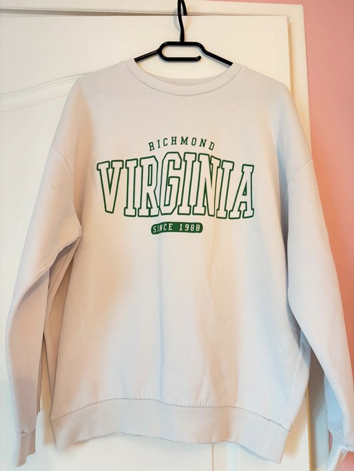 Pull à écritures