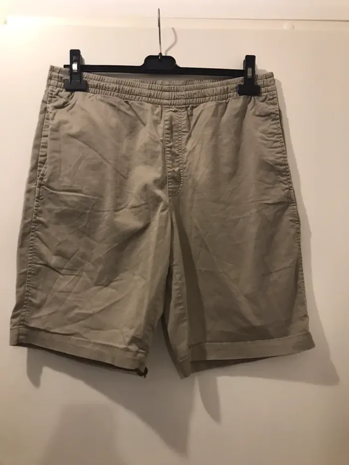Short bernuda uni olo homme avec poche sur le côté et derrière crème taille L