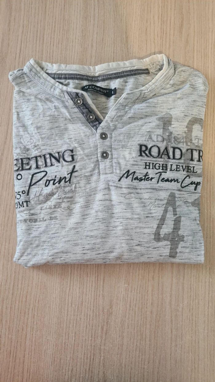 Haut/polo manches longues taille L Armand Thiery